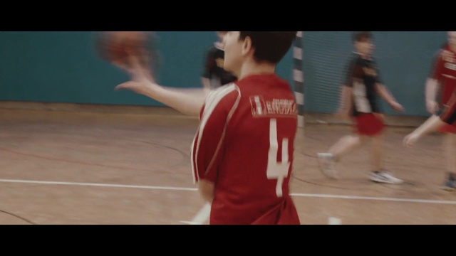 Video Reference N2: red, sports, player, basketball player, lady, sport venue, competition, youth, basketball, tournament