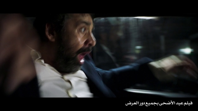 Video Reference N2: Human, Photography, Gentleman, Movie, Darkness, Fictional character, Person, Man, Indoor, Looking, Sitting, Front, Laptop, Computer, Wearing, Black, Dark, Table, Using, Shirt, Screen, Holding, Suit, Young, Food, Red, White, Room, Blurry, Standing, Screenshot, Human face