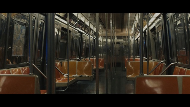 Video Reference N5: Transport, Iron, Public transport, Metal, Building, Metro, Window, Train, Room, Bus, Sitting, Large, Table, Glass, Display, Orange, Standing, Different, Store, Subway, Station, Group, White, Man, Kitchen, Living, Refrigerator, Street, Text, Vehicle