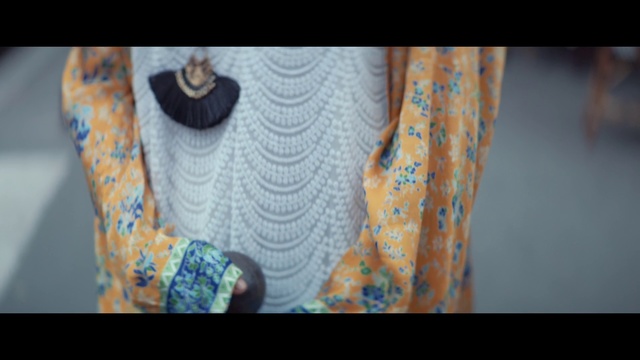 Video Reference N1: Blue, Orange, Aqua, Turquoise, Textile, Pattern, Design, Visual arts, Neck, Photo, Cat, Small, Sitting, Table, Colorful, White, Different, Holding, Room, Shirt, Standing, Laying, Man, Colored