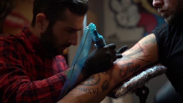 Video Reference N22: Tattoo, Arm, Tattoo artist, Design, Temporary tattoo, Flesh, Beard