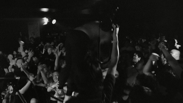 Video Reference N2: people, crowd, black, performance, audience, concert, entertainment, stage, black and white, rock concert
