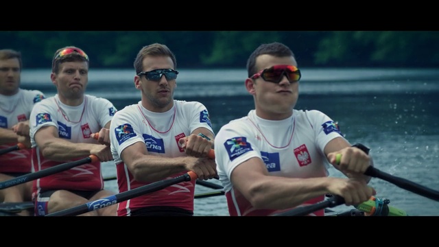 Video Reference N2: Boating, Rowing, Team, Recreation, Watercraft rowing, Crew, Fun, Vehicle, Canoe, Championship, Person, Sport, Man, Player, Holding, Baseball, Bat, Playing, Game, Standing, Water, People, Ball, Group, Boat, Woman, Swinging, Field, Riding, Red, Sunglasses, Clothing, Glasses, Human face, Goggles