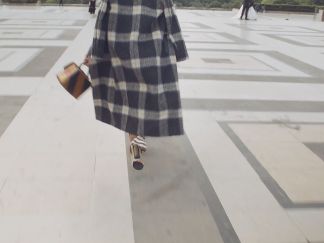 Video Reference N0: outerwear, design, line, pattern, floor, plaid, Person