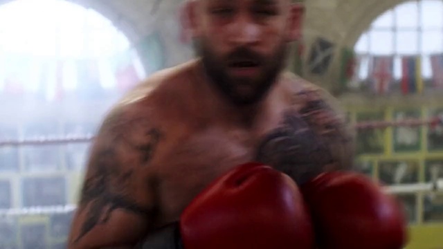Video Reference N21: Barechested, Chest, Boxing, Facial hair, Professional boxing, Muscle, Arm, Boxing glove, Mouth, Boxing equipment