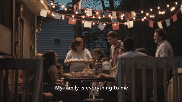 Video Reference N1: family, dinner, family, house, celebration, birthday, people, happy, food, table, outside, Person