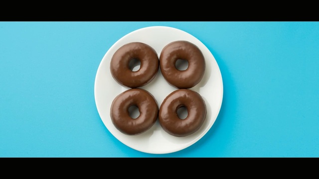 Video Reference N7: doughnut, praline, chocolate, dessert, petit four, finger food, glaze, pastry