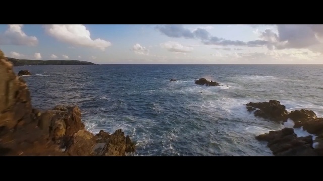 Video Reference N1: coast, sea, body of water, sky, coastal and oceanic landforms, ocean, shore, horizon, rock, promontory