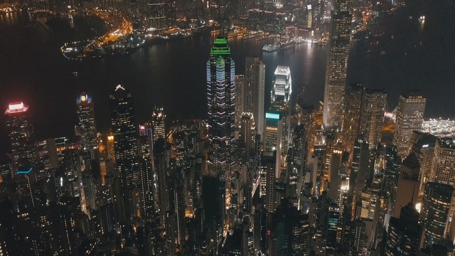 Video Reference N1: cityscape, city, metropolitan area, metropolis, skyscraper, night, urban area, skyline, reflection, downtown