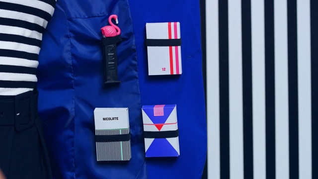 Video Reference N0: Blue, Cobalt blue, Clothing, Sportswear, Jersey, Electric blue, Uniform, Flag, Sleeve, Shirt, Striped, White, Table, Sitting, Black, Man, Holding, Large, Pair, Bed, Cutting, Display, Phone, Woman, Laying, Group, Standing, Text, Design