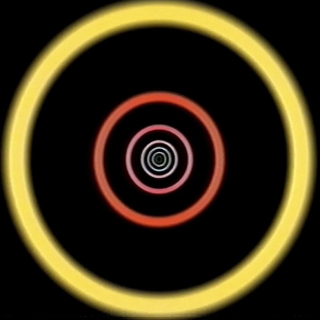 Video Reference N7: yellow, circle, spiral, computer wallpaper, font, spoke, graphics, wheel, rim, symbol