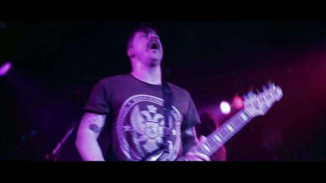 Video Reference N1: guitarist, singing, musician, rock concert, string instrument accessory, purple, stage, string instrument, bassist, music artist, Person