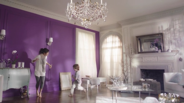 Video Reference N2: purple, room, interior design, ceiling, living room, function hall, furniture, home, decor, dining room, Person
