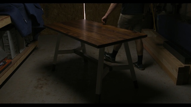 Video Reference N1: furniture, table, wood, light, desk, floor, chair, darkness, angle, flooring