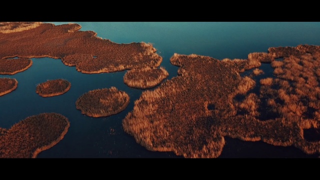 Video Reference N9: Water, Archipelago, Rock, Geological phenomenon, Island, Geology, Coastal and oceanic landforms, Aerial photography, Landscape, Reflection