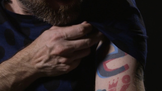 Video Reference N6: facial hair, hand, finger, neck, arm, muscle, mouth, joint, tattoo