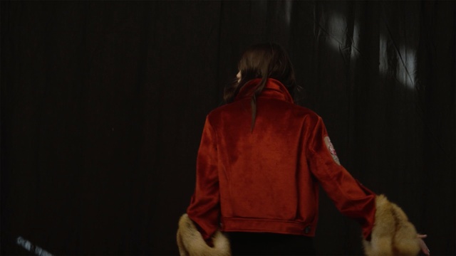 Video Reference N8: Red, Black, Darkness, Outerwear, Jacket, Room, Performance, Night, Photography