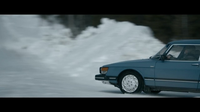 Video Reference N1: car, vehicle, full size car, mode of transport, personal luxury car, automotive design, snow, performance car, hatchback, group b, Person