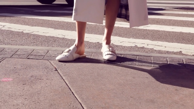 Video Reference N0: White, Footwear, Photograph, Human leg, Leg, Shoe, Sidewalk, Public space, High heels, Snapshot