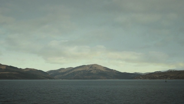 Video Reference N0: Sky, Body of water, Highland, Mountainous landforms, Sea, Mountain, Cloud, Loch, Horizon, Sound