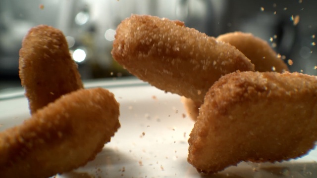 Video Reference N1: croquette, fried food, dish, chicken nugget, appetizer, frying, food, deep frying, rissole, fish stick
