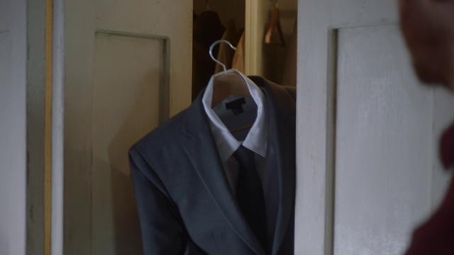 Video Reference N1: Suit, Clothing, Formal wear, Outerwear, Tuxedo, Blazer, Room, Clothes hanger, Dress, Jacket