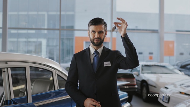 Video Reference N0: Motor vehicle, Luxury vehicle, Vehicle, Car, Automotive design, Car dealership, White-collar worker, Businessperson, Suit, Person