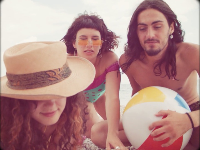 Video Reference N2: Beauty, Hat, Friendship, Headgear, Cool, Smile, Happy, Selfie, Fashion accessory, Love, Person, Woman, Surfing, Holding, Posing, Photo, Sitting, White, Food, People, Couple, Man, Standing, Plate, Young, Girl, Smiling, Table, Sign, Beach, Human face, Sun hat, Swimwear, Clothing, Summer