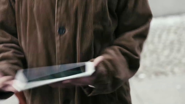Video Reference N3: Jacket, Wood, Technology, Gadget, Hand, Electronic device, Outerwear, Hardwood, Coat, Leather