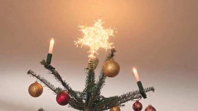 Video Reference N10: Christmas decoration, Candle, Lighting, Christmas tree, Christmas ornament, Christmas lights, Branch, Interior design, Christmas eve, Christmas