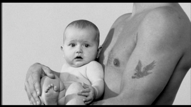 Video Reference N1: photograph, skin, black and white, person, child, monochrome photography, infant, photography, hand, arm