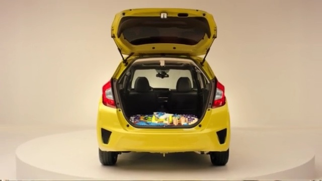 Video Reference N4: car, motor vehicle, vehicle, yellow, vehicle door, automotive design, mode of transport, city car, bumper, automotive exterior
