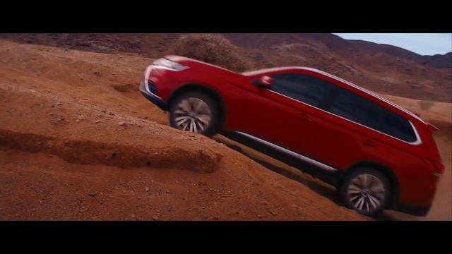 Video Reference N3: car, motor vehicle, red, vehicle, mode of transport, automotive design, off roading, vehicle door, sky, landscape, Person