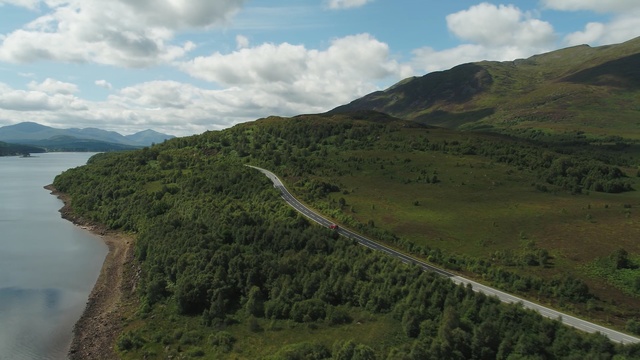 Video Reference N2: highland, road, hill, sky, coast, promontory, loch, cloud, tree, mountain