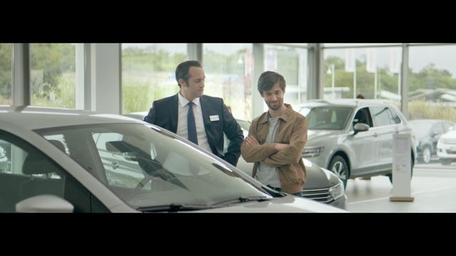 Video Reference N6: man, business, car, businessman, male, adult, office, laptop, people, corporate, person, sitting, professional, happy, computer, automobile, executive, working, vehicle