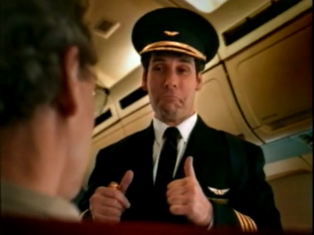 Video Reference N6: official, military, fun, military person, gentleman, finger, uniform, smile, conversation, Person