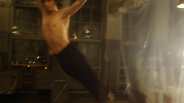 Video Reference N12: Muscle, Arm, Barechested, Leg, Room, Human body, Photography, Dance, Performance, Performance art, Indoor, Person, Cat, Man, Looking, Front, Standing, Kitchen, Holding, Living, Blurry, Glass, Woman, Table, Oven, White, Human face