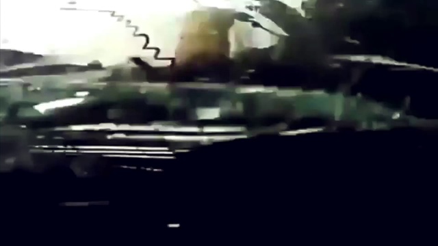 Video Reference N3: Black, Windshield, Photograph, Green, Light, Mode of transport, Snapshot, Glass, Sky, Automotive exterior