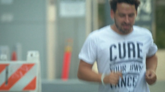 Video Reference N2: t shirt, male, muscle, arm, facial hair, hand, player, physical fitness, product, fun, Person