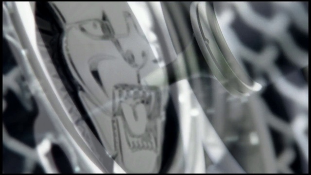 Video Reference N2: Rim, Automotive design, Wheel, Black-and-white, Anime, Font, Tire, Close-up, Automotive wheel system, Photography