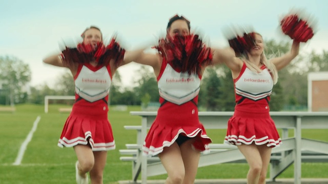 Video Reference N3: red, cheerleading, cheerleading uniform, cheering, sports, team sport, team, girl, uniform, competition event