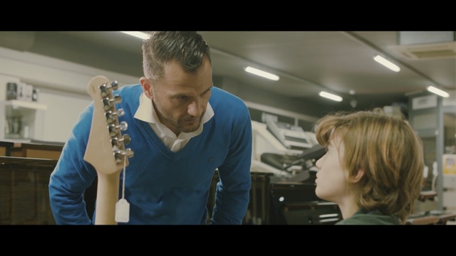 Video Reference N4: man, boy, guitar, father, son, Person