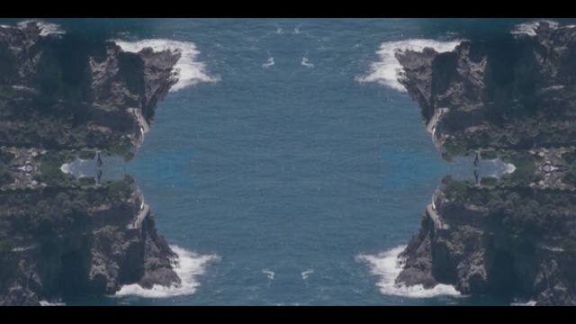 Video Reference N1: coastal and oceanic landforms, cliff, coast, promontory, sky, geological phenomenon, sea, terrain, ocean, aerial photography