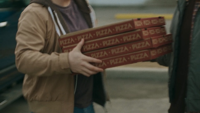 Video Reference N0: man, men, pizza, eat, delivery