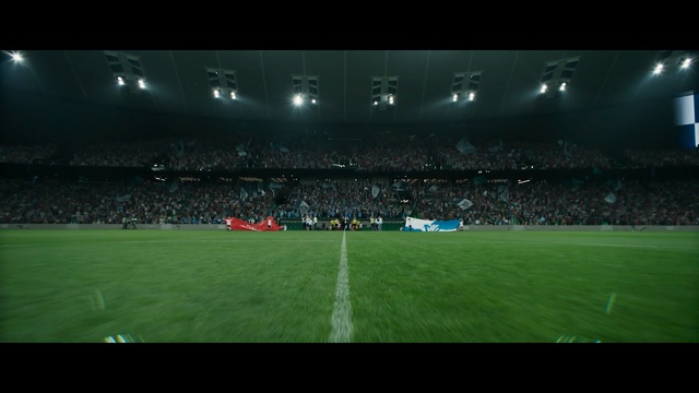 Video Reference N11: Stadium, Sport venue, Arena, Atmosphere, Soccer-specific stadium, Football, Player, Team sport, Ball game, Grass, Building, Field, Man, Game, Ball, Large, Playing, Standing, Green, People, Ready, Night, Soccer, Match, Holding, Court, Baseball, White, Group, Red, Swinging, Air, Riding, Sign, Person, Artificial turf