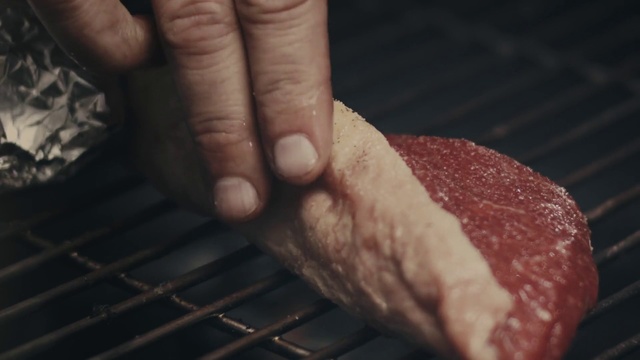 Video Reference N7: Food, Red meat, Flesh, Finger, Hand, Grilling, Rump cover, Dish, Cuisine, Animal fat