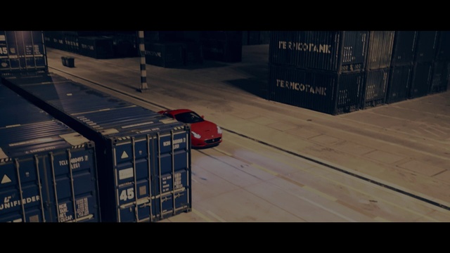 Video Reference N0: Mode of transport, Vehicle, Transport, Screenshot, Car, Race car, Pc game, Indoor, Sitting, Building, Table, Man, Room, Large, Riding, Luggage, Platform, Board, Red, Suitcase, Standing, Train, Ramp, White, City, Parked, Land vehicle, Floor, Text, Wheel, Video game