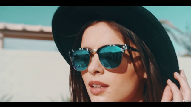 Video Reference N0: Eyewear, Sunglasses, Face, Glasses, Cool, Hair, Lip, Head, Beauty, Vision care, Person, Woman, Wearing, Looking, Holding, Lady, Cellphone, Phone, Girl, Talking, Using, Close, Black, Female, Mirror, Blue, White, Red, Young, Goggles, Standing, Hat, Human face, Fashion accessory, Selfie, Spectacles, Staring