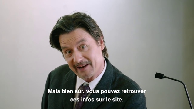 Video Reference N3: Microphone, Chin, Forehead, Facial hair, Spokesperson, Businessperson, White-collar worker, Audio equipment, Public speaking, Moustache