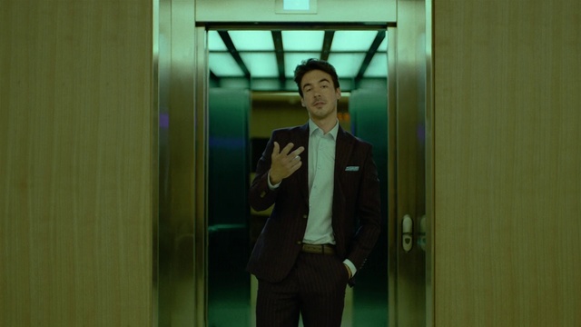 Video Reference N1: Green, Standing, Snapshot, Suit, Formal wear, Door, Elevator